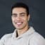 Male patient smiling and providing a satisfied testimonial for healthcare services